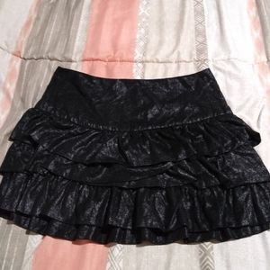 Black ruffled mini skirt